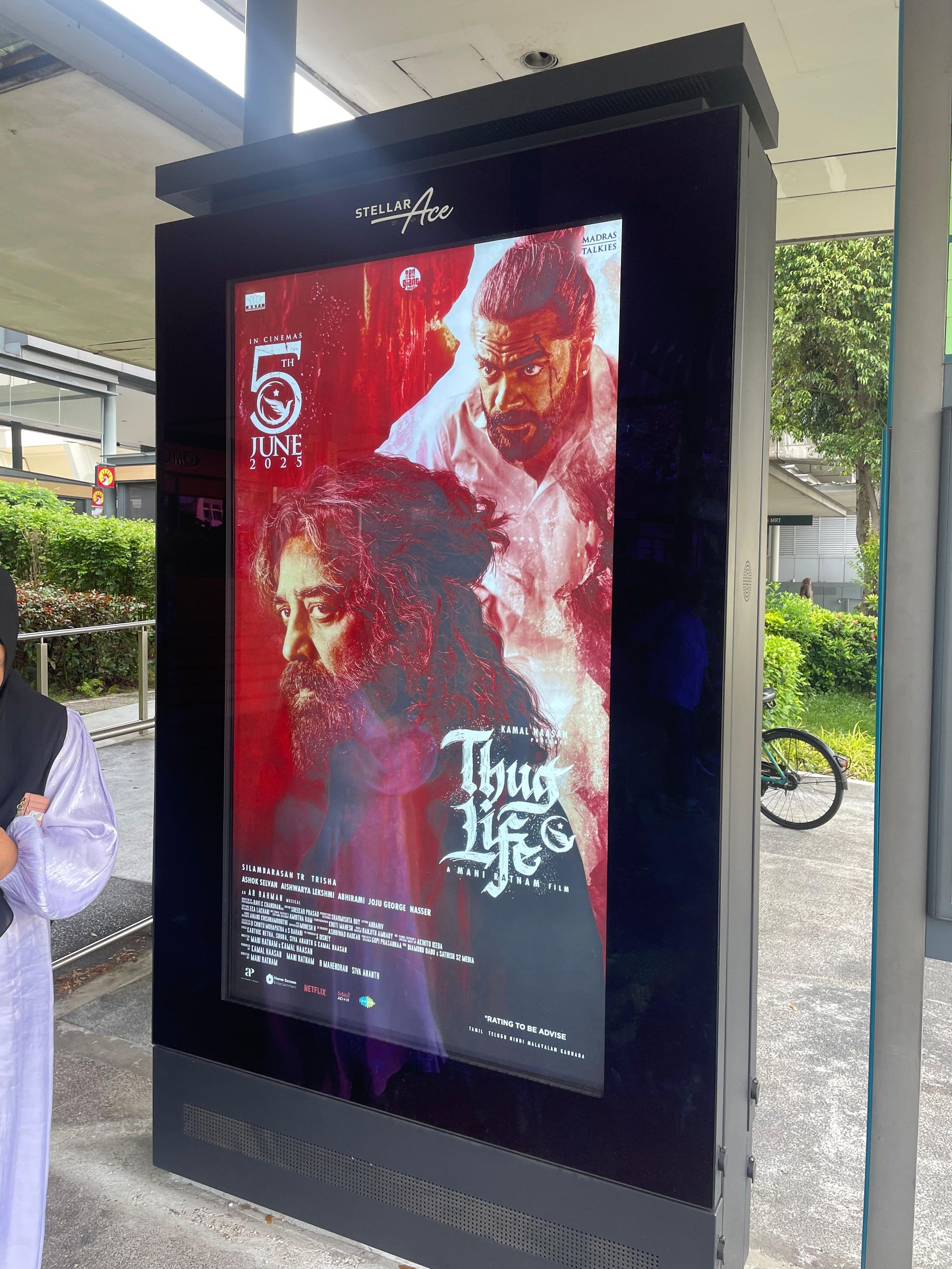 Digital advertising screen at a Singapore bus shelter